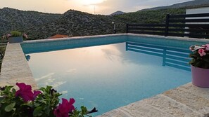 Outdoor pool, a heated pool, open open 24 hours a day, pool umbrellas - Apartments Aura (Seget)