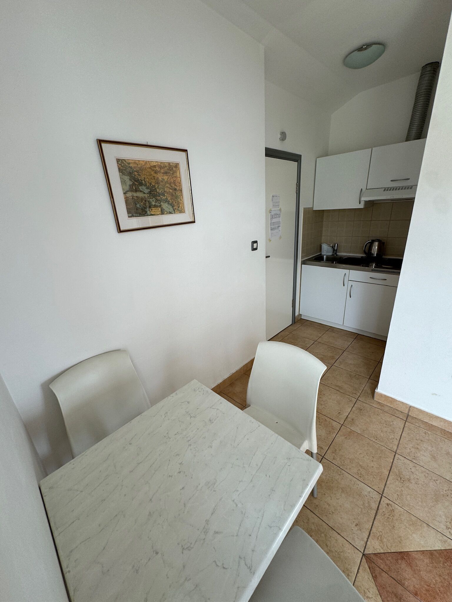 Apartment (A1) | Private kitchen | Fridge, stovetop, electric kettle, cookware/dishes/utensils