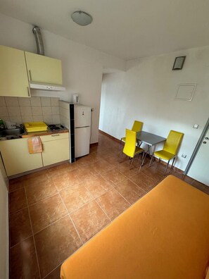 Apartment (A6) | Private kitchen | Fridge, stovetop, electric kettle, cookware/dishes/utensils - Apartments Klara (Gradac)
