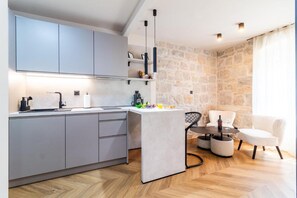 Studio (A1) | Private kitchen | Fridge, stovetop, dishwasher, espresso maker - Apartments Centre In Stone House (Split)