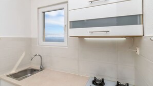 Apartemen (A1) | Dapur pribadi | Mesin espresso, lemari es, oven, dan kompor