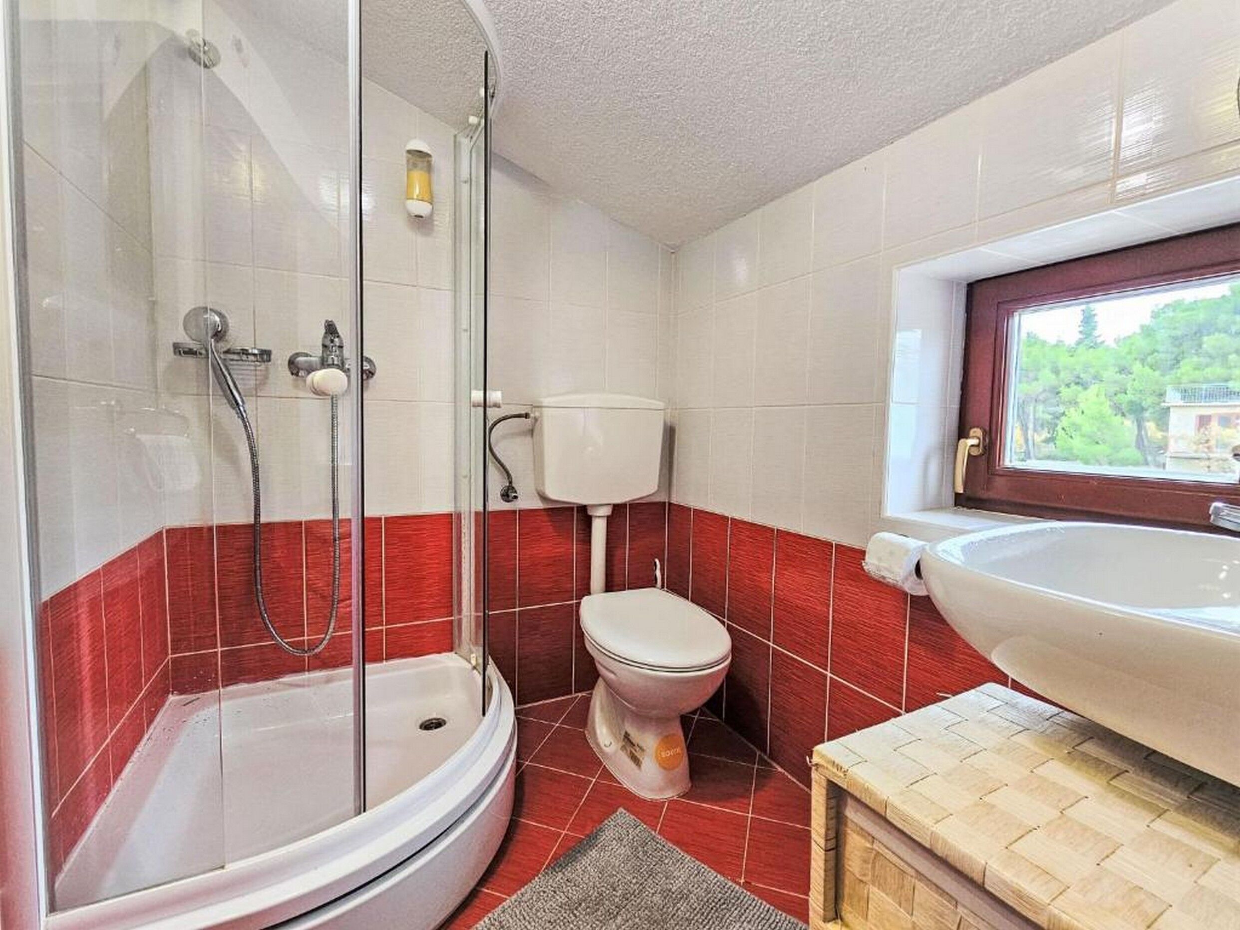 Apartment (A1) | Bathroom | Shower, towels, soap, toilet paper