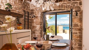 Apartment (A1) | Private kitchen | Espresso maker, fridge, oven, stovetop - Apartments Beachfront Pebble (Pasman)