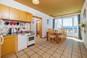 Apartment (A1) | Private kitchen | Fridge, stovetop, espresso maker, electric kettle - Apartments Nana (Novi Vinodolski)