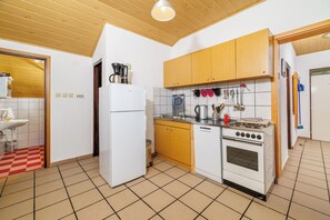 Apartment (A1) | Private kitchen | Fridge, stovetop, espresso maker, electric kettle - Apartments Nana (Novi Vinodolski)