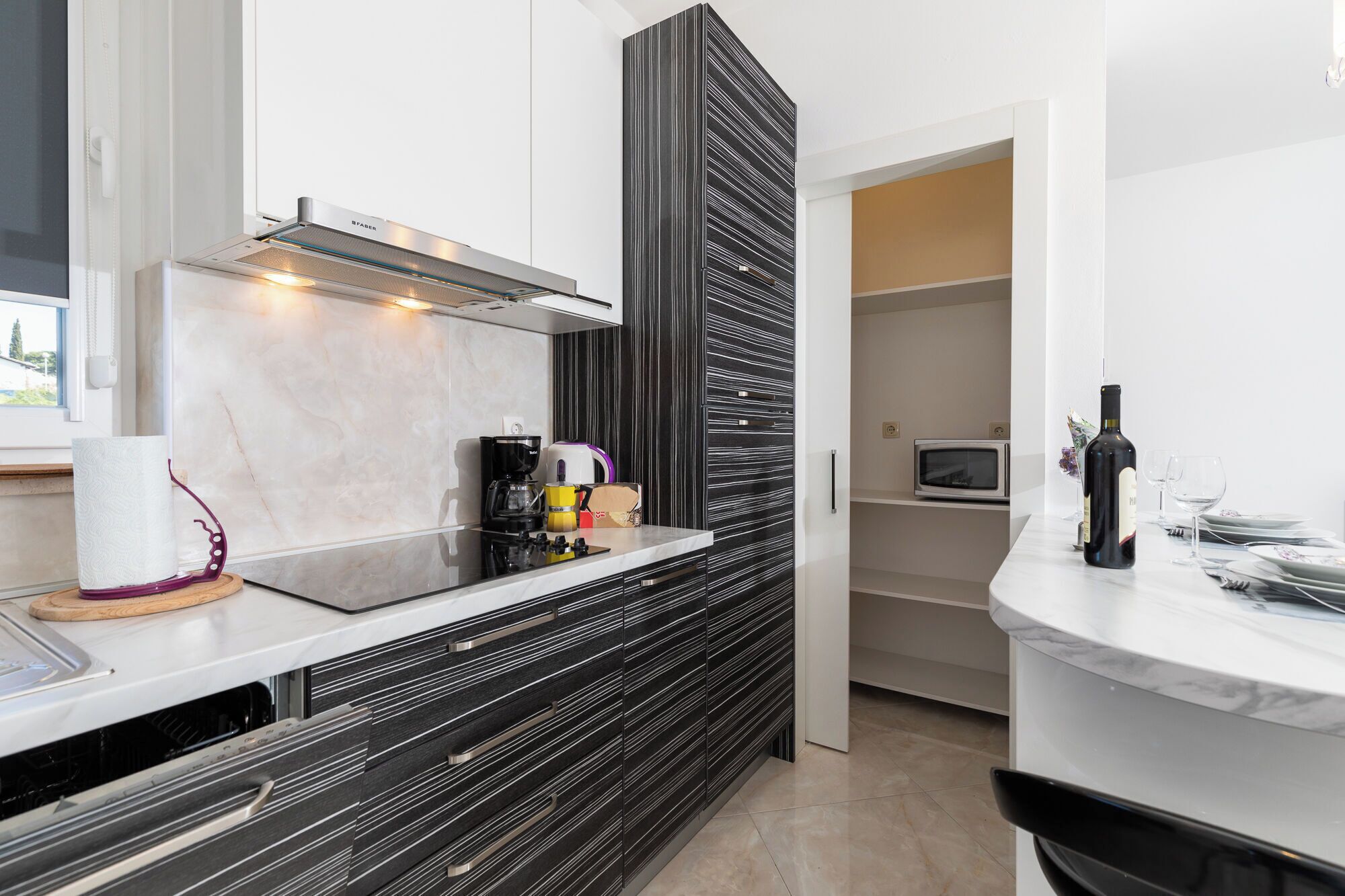 Apartment (A1) | Private kitchen | Fridge, microwave, stovetop, dishwasher