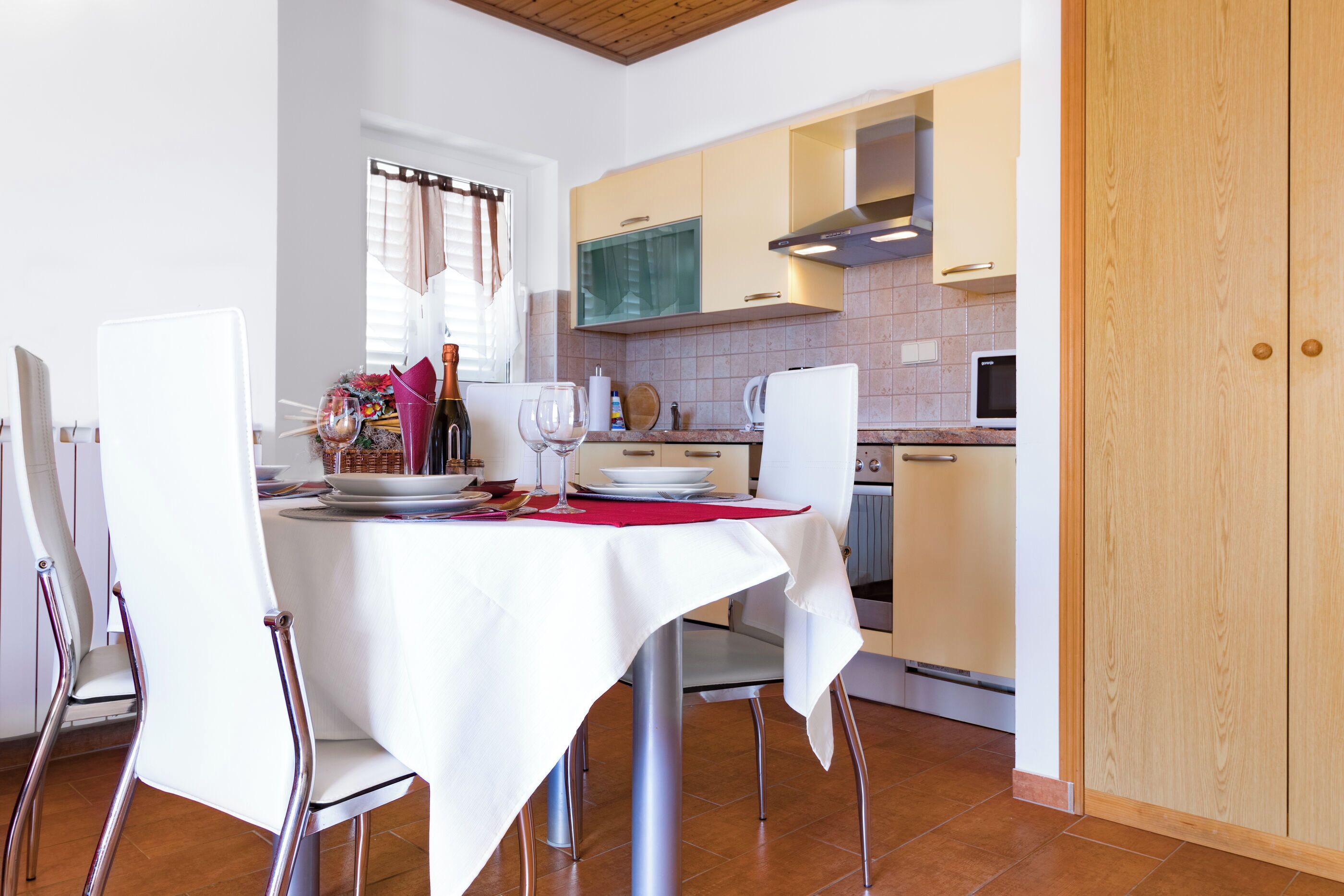 Apartment (A2) | Private kitchen | Fridge, microwave, stovetop, dishwasher