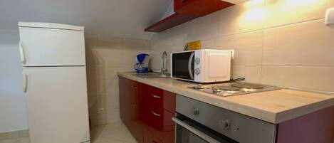 Lejlighed (A1) | Privat køkken | Køleskab, mikrobølgeovn, ovn, kogeplade