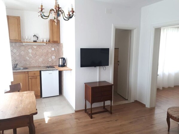 Appartement (A4) | Cuisine privée | Réfrigérateur, plaque de cuisson, machine à expresso