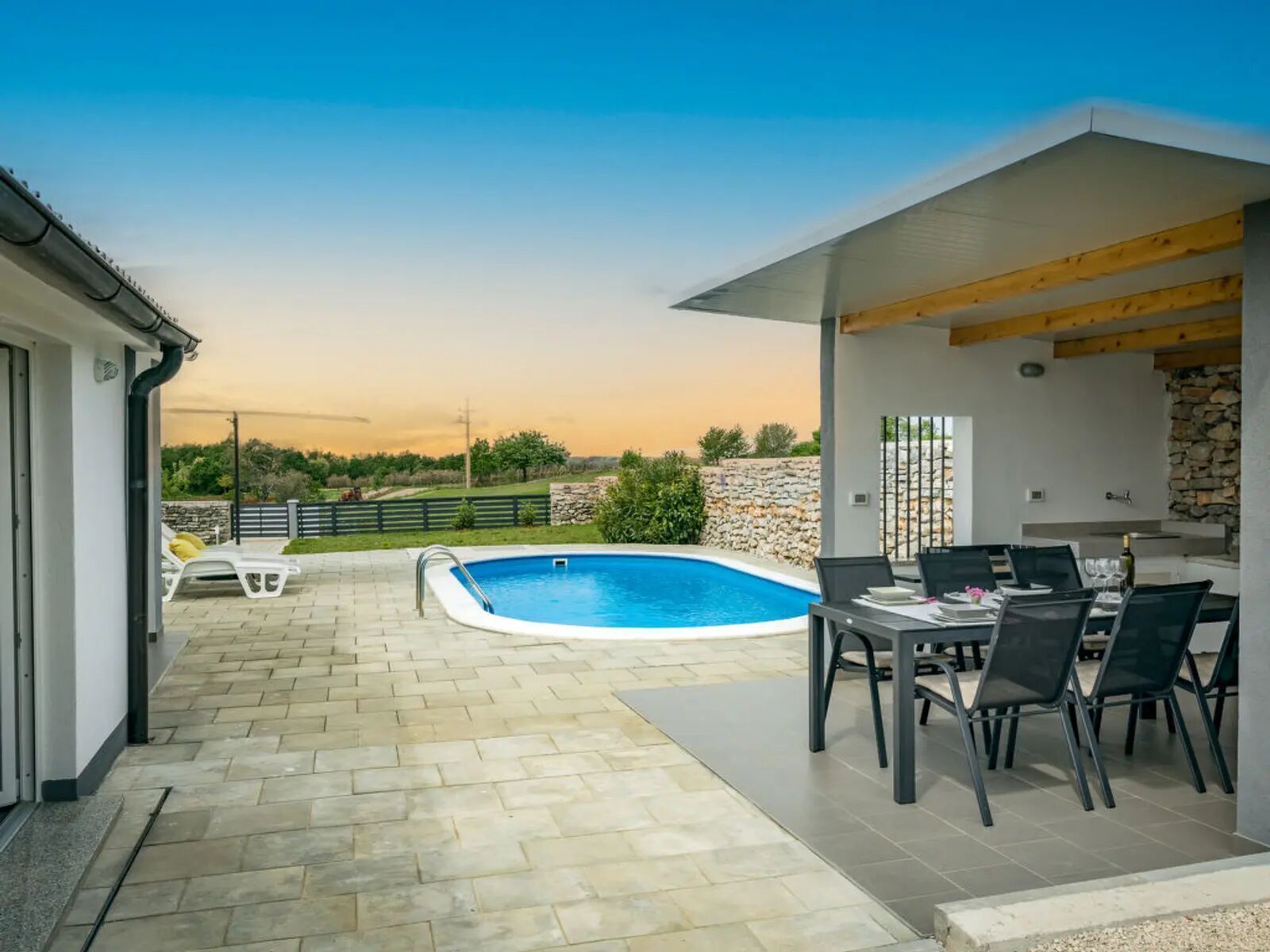 Outdoor pool, an infinity pool, open open 24 hours a day, pool umbrellas