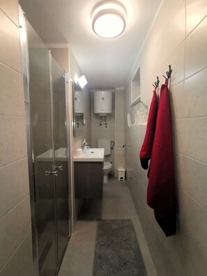 Studio (A1) | Bathroom | Shower, towels, toilet paper - Apartment Sweet Studio (Punat)