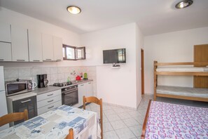 Studio (A2) | Living room - Apartment Duba by the sea (Pag)