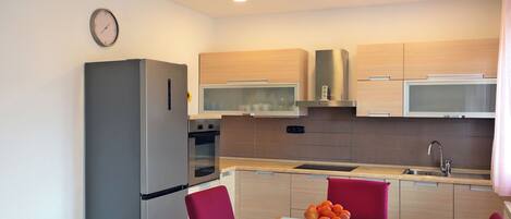 Apartment (A1) | Private kitchen | Fridge, microwave, oven, stovetop