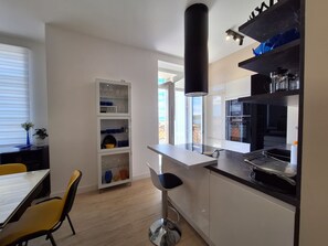 Apartment (A3) | Private kitchen | Fridge, microwave, oven, stovetop - Apartments Mar (Crikvenica)