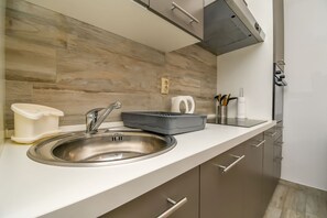 Apartment (A1) | Private kitchen | Fridge, microwave, stovetop, espresso maker - Apartments Vojko (Marina)
