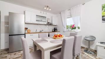 Apartment (A1) | Private kitchen | Oven, stovetop, dishwasher, coffee/tea maker