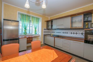 Apartment (A3) | Private kitchen | Fridge, microwave, oven, stovetop - Apartments Hari (Rab)