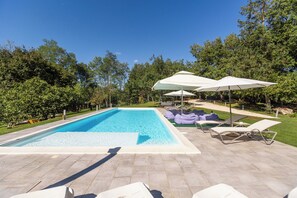 Outdoor pool, an infinity pool, open open 24 hours, pool umbrellas