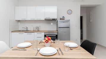 Apartment (A2) | Private kitchen | Fridge, oven, stovetop, dishwasher
