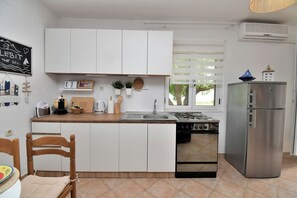House | Private kitchen | Espresso maker, fridge, oven, stovetop - House Velebit by the sea (Senj)