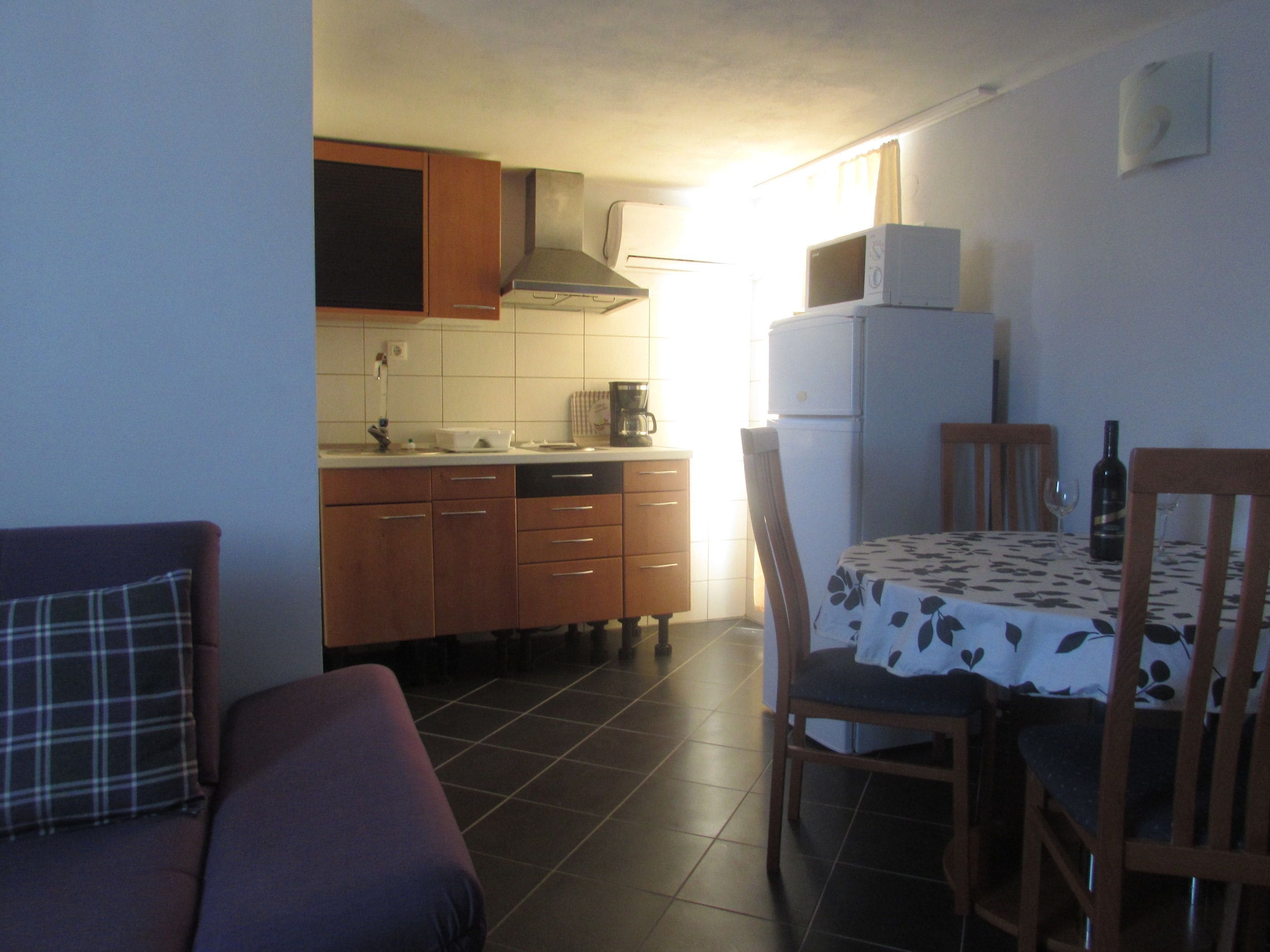 Apartment (A4) | Private kitchen | Fridge, microwave, stovetop, electric kettle