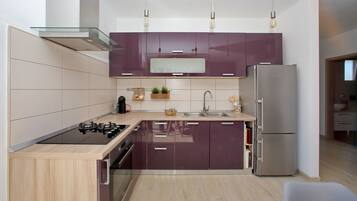 Leilighet (A2) | Eget kjøkken | Kjøleskap, mikrobølgeovn, kokeplater og espressomaskin