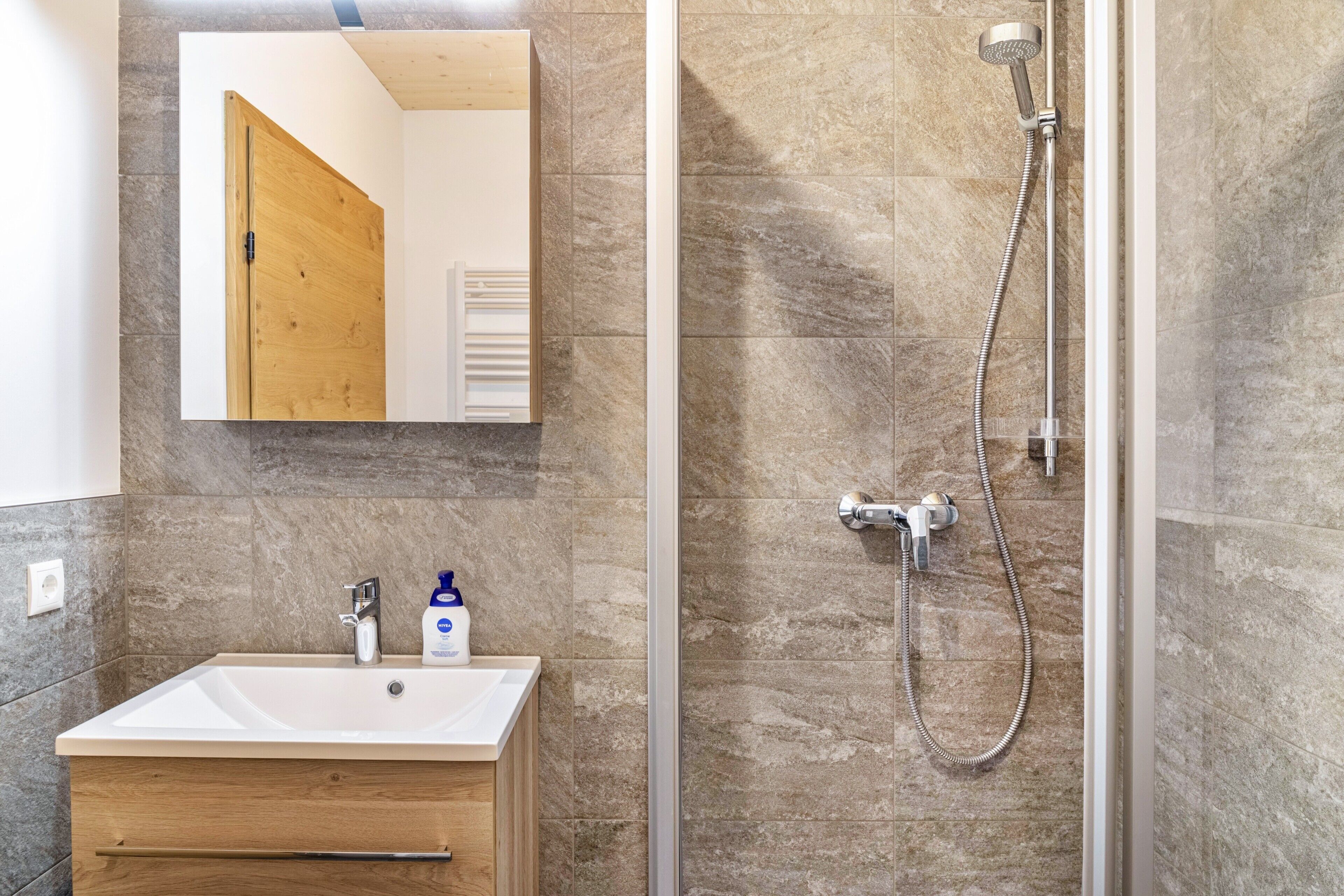 Shower, free toiletries, hair dryer, towels