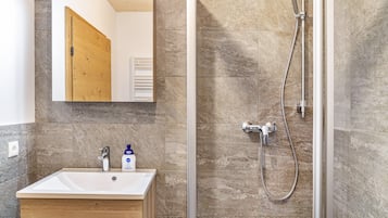 Shower, free toiletries, hair dryer, towels