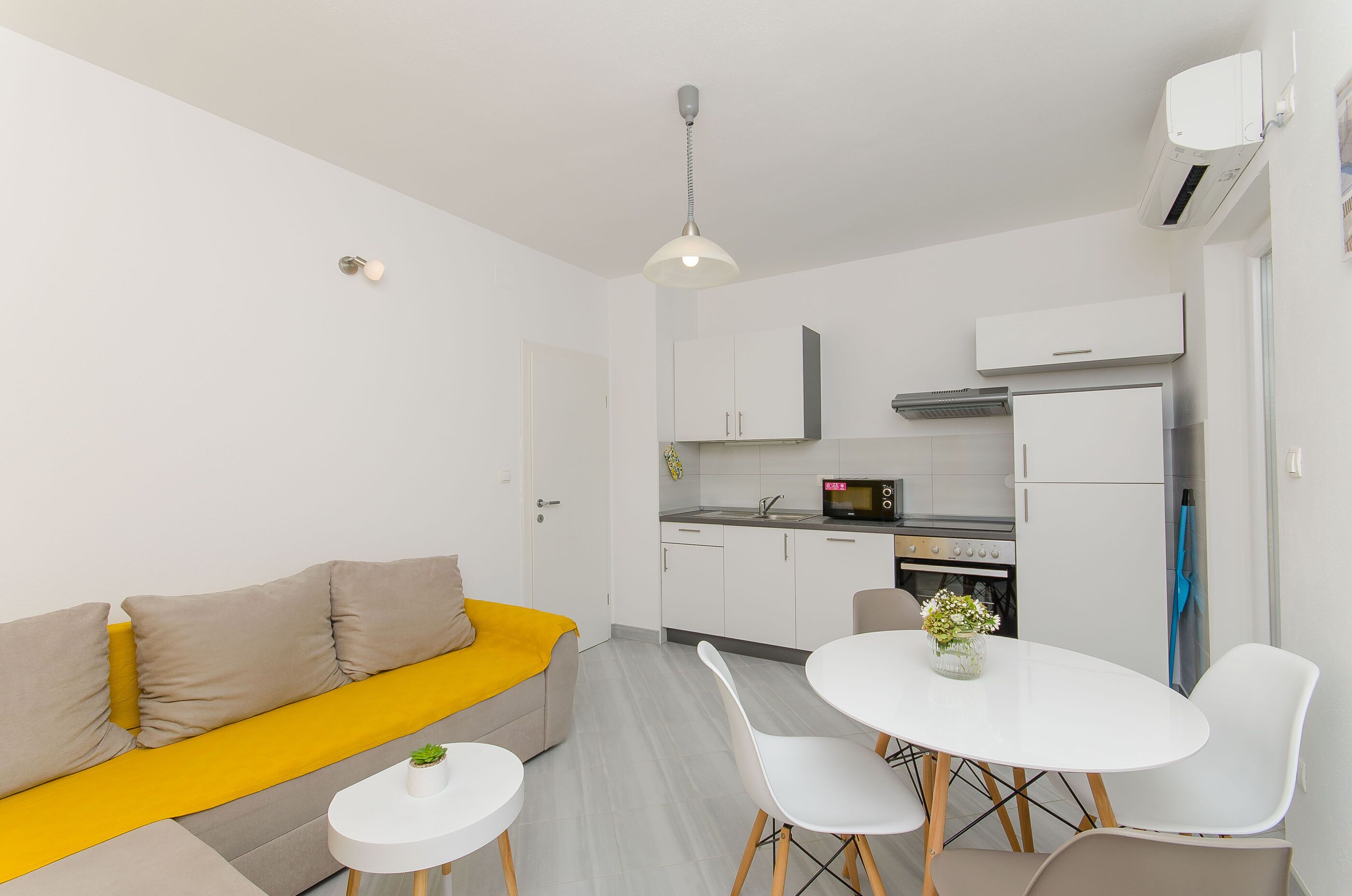 Apartment (A2) | Private kitchen | Fridge, microwave, oven, stovetop
