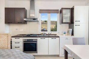 Apartment (A1) | Private kitchen - Apartment Diana (Povljana)