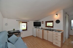 Apartment (A2) | Private kitchen | Fridge, stovetop, espresso maker, electric kettle - Apartments Petra (Fazana)