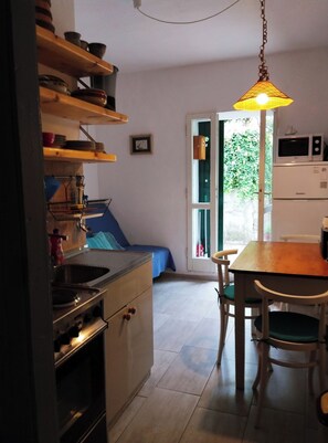 Apartment (A1) | Private kitchen | Fridge, microwave, oven, stovetop - (Omis)