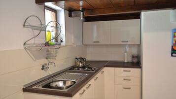 House | Private kitchen | Fridge, stovetop, cookware/dishes/utensils, cleaning supplies