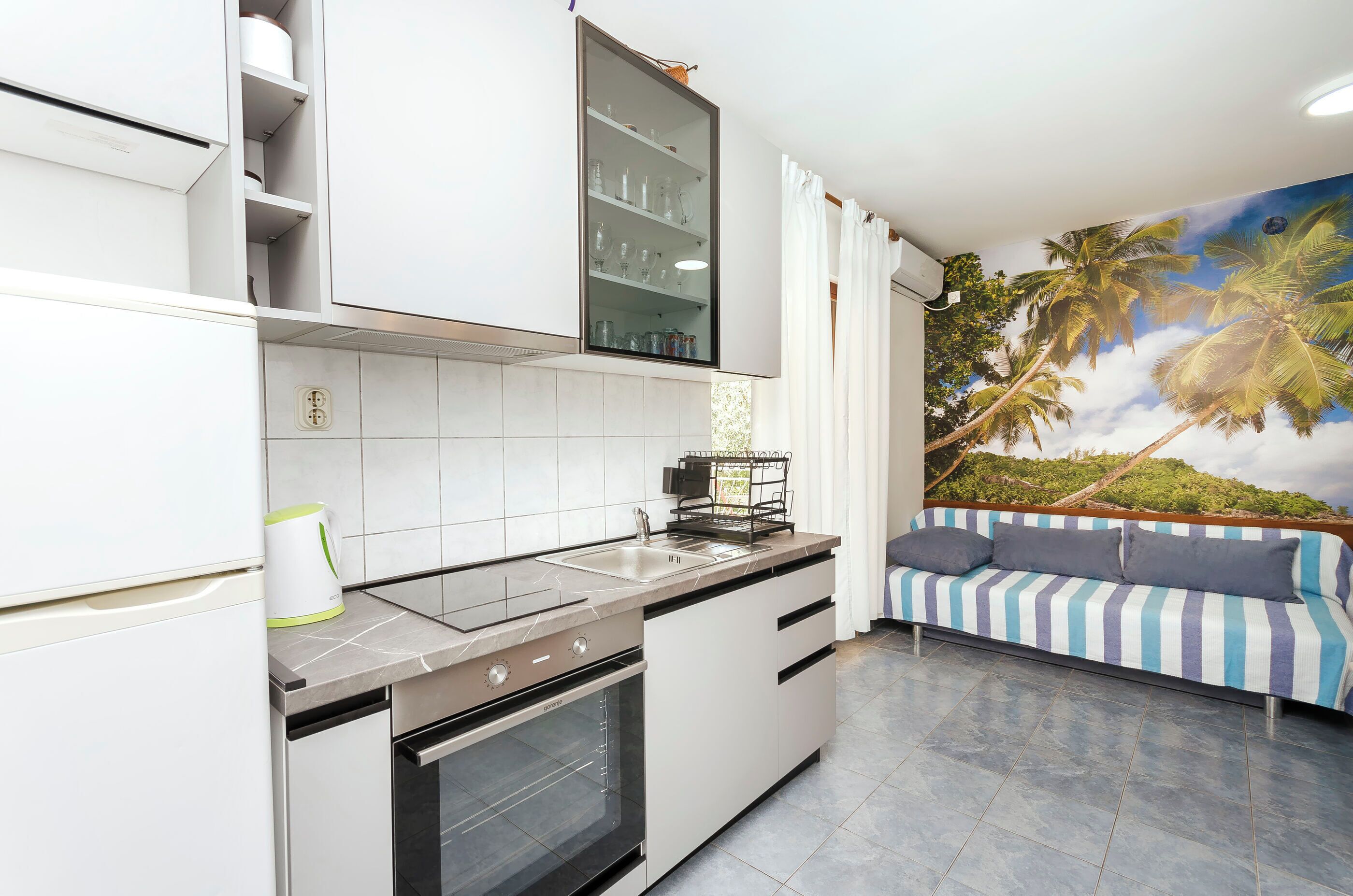 Apartamento (A1) | Cocina privada | Frigorífico, horno, placa de cocina y máquina de café espresso