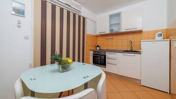 Apartment (A3) | Private kitchen | Fridge, microwave, stovetop, electric kettle