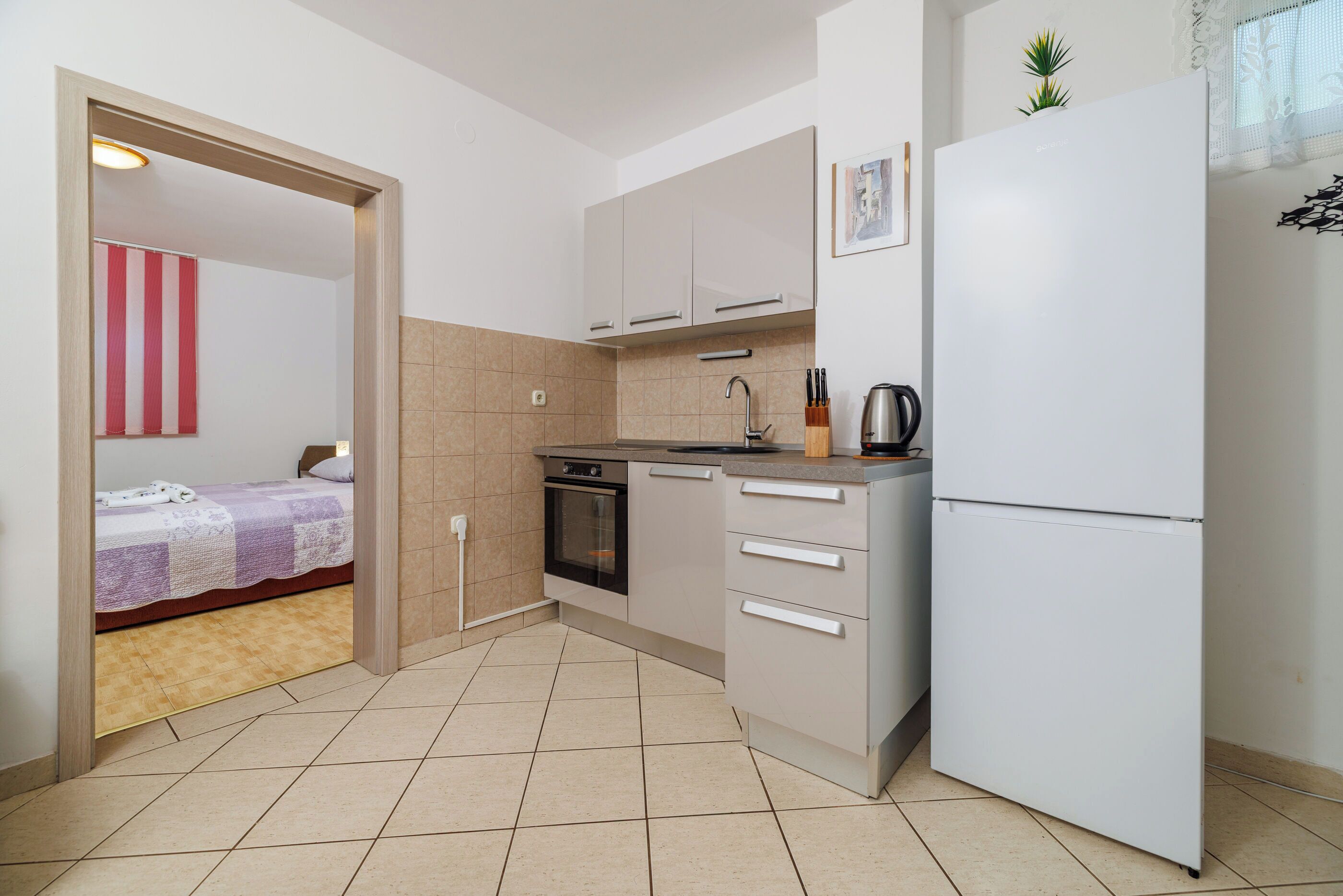 Apartment (A2) | Private kitchen | Mini-fridge
