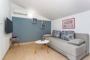 Apartment (A2) | Wohnzimmer | Flachbildfernseher