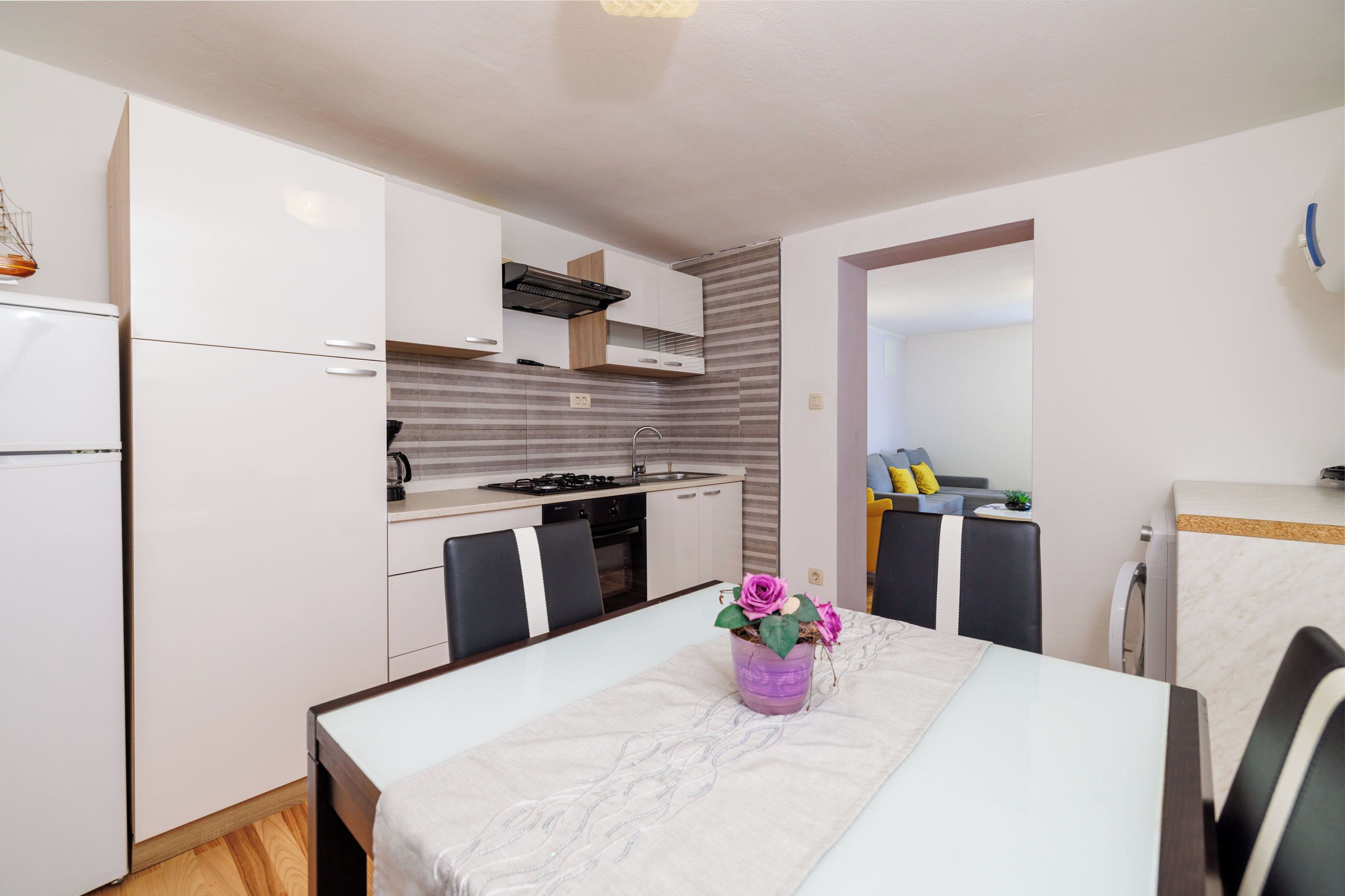 Apartamento (A2) | Cozinha privada | Geladeira, fogão, cooktop, máquina de café expresso