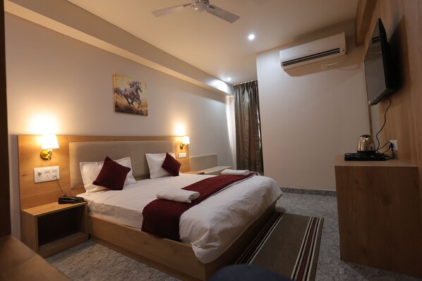 Desk, laptop workspace, blackout curtains, free WiFi