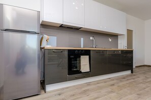 Apartment (A1) | Private kitchen | Fridge, oven, stovetop, dishwasher - Apartment Rozalia (Seget)
