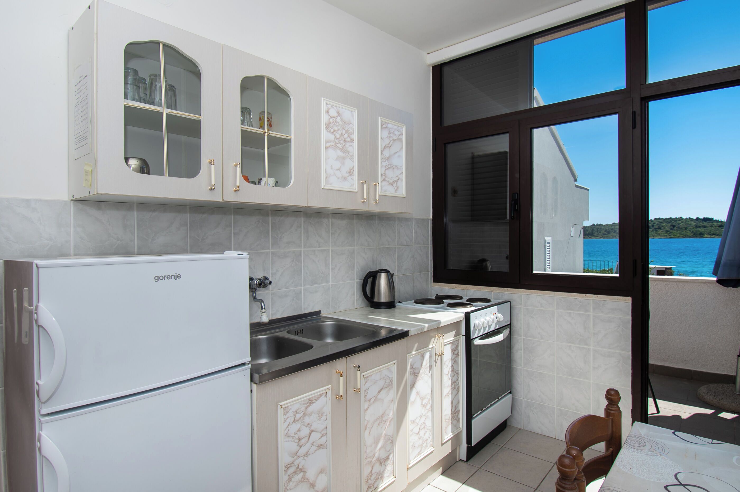Apartment (A2) | Private kitchen | Fridge, oven, stovetop, cookware/dishes/utensils