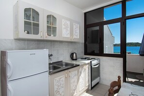 Apartment (A2) | Private kitchen - Apartments Goran Near the Beach (Vodice)