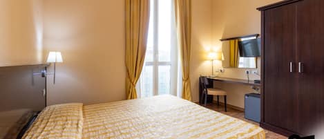 Dobbelt- eller tomannsrom – standard | Minibar, safe på rommet, wi-fi (inkludert) og sengetøy