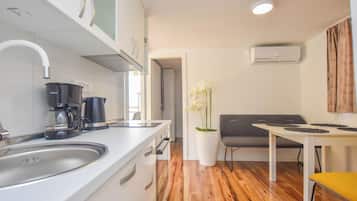Apartment (A2) | Private kitchen | Espresso maker, fridge, oven, stovetop