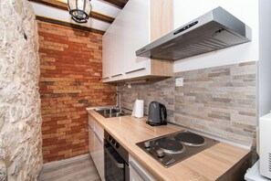 Apartment (A1) | Private kitchen - Apartment Rustika (Skradin)