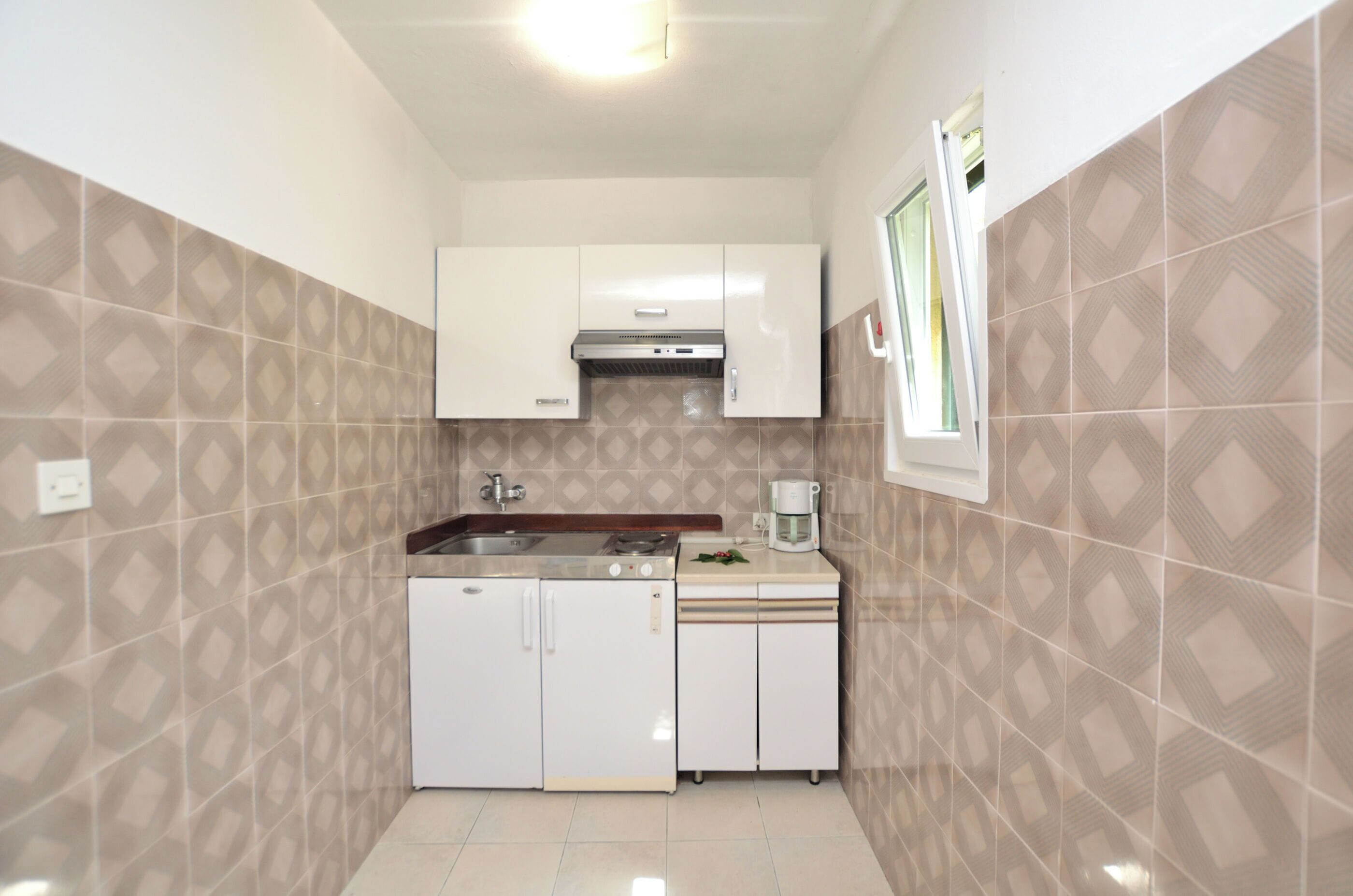 Apartment (A1) | Private kitchen | Fridge, stovetop, espresso maker, electric kettle