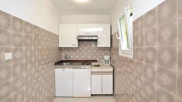 Apartment (A1) | Private kitchen | Fridge, stovetop, espresso maker, electric kettle