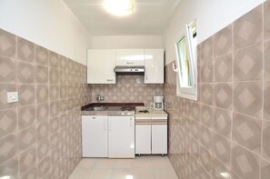 Apartment (A1) | Private kitchen | Fridge, stovetop, espresso maker, electric kettle - Apartments Pintur (Medulin)