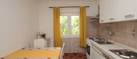 Apartment (A2) | Private kitchen | Fridge, stovetop, espresso maker, electric kettle