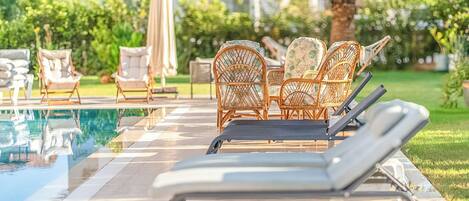 Outdoor pool, pool umbrellas, pool loungers